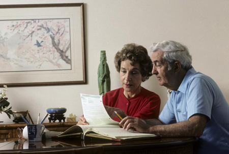 Elderly Couple Discussing Reverse Mortgages in Los Angeles, CA